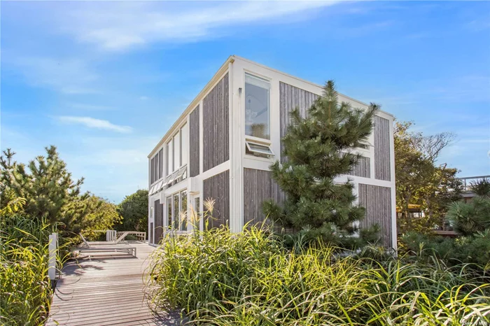 Outstanding midcentury with superb ocean views. Situated high on the secondary dune. Three bedrooms 2.5 baths with large pool deck.