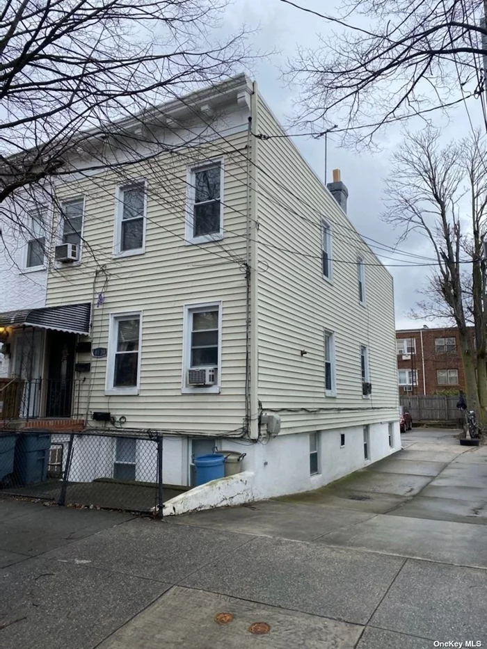 Ozone Park; 3 Family; 5 Bedrooms; 3 Baths; 3 Kitchens; Private Driveway; 4 Private Rear Parking Spot; Gas Heat; New Water Heater; Updated Baths; Updated Windows. tenant paying $1, 800 (New lease) top floor tenant paying $2, 200 (new lease).
