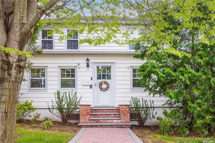 Elegantly nestled in the heart of Oyster Bay, this delightful 3-bedroom, 1.5-bathroom gem exudes charm. A spacious living room offers views of the deck and a beautiful IG pool. A generously sized dining room seamlessly connects to a custom-designed kitchen and an enclosed front porch adds character with the convenience of a powder room and laundry. The property boasts a 2-car detached garage and enjoys proximity to the village, shops, beach, and park, making it an ideal home.