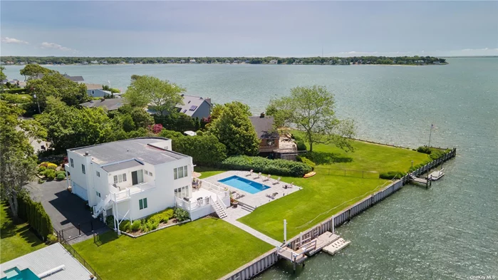 SEPT TO MAY 15th IN THE HAMPTONS! An amazing waterfront property, this beautifully maintained home features open bay views; heated inground pool; dock, a primary suite; a second ensuite bedroom; 3 additional guest bedrooms; 3.5 bathrooms; bi-level decks; well equipped kitchen; formal dining room; breakfast nook; Guest Quarters w/a separate entrance & summer kitchen; and an attached 2-car garage. Tastefully furnished, this home is ideal as a luxurious residence. Minutes to ocean and bay beaches, marinas, fine dining, boutiques, galleries, iconic golf courses, fishing grounds, shopping malls, vineyards and all The Hamptons has to offer. Pets upon review. Tenants responsible for Utilities and maintenance. ENJOY Fall Farm & Vineyard Events - Winter Holidays - The Splendor Of Our Colorful Spring. $7, 500 per mo. Flexible Schedules Available.