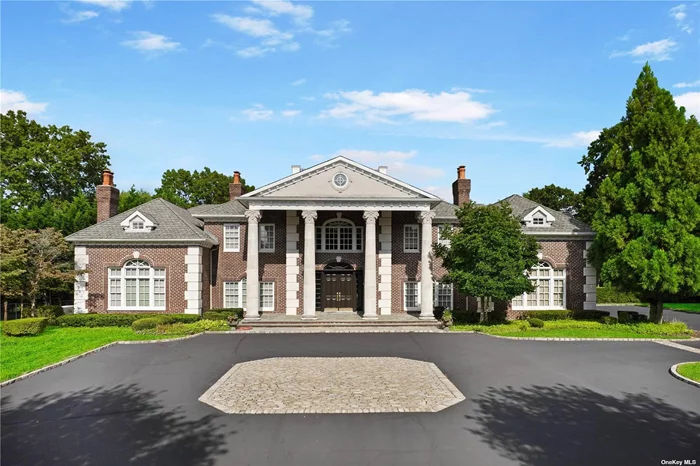 Welcome to 3 Tatem Way, where a palatial entrance framed by towering columns sets the stage for an unparalleled life of luxury. Nestled within a prestigious private gated community in Old Westbury and sprawled across over 4 acres, this grand estate opens with an awe-inspiring foyer. Its two-story height, 40-foot ceilings, architectural staircase, and breathtaking domed ceiling prepare you for the exquisite details that unfold within. As you move further inside, you&rsquo;re greeted by an oversized gourmet kitchen with coffered ceiling detail which boasts custom Cherry wood cabinets, dual Miele dishwashers, two king-size Sub Zero refrigerator freezers, a Thermador double wall oven, range, and warming drawer. An adjoining butler&rsquo;s pantry features a wine refrigerator, ensuring you&rsquo;re always prepared for entertaining. The home also offers a sprawling 2, 000 sqft master suite, a Mahogany-paneled library, and seven luxurious marble and granite bathrooms. In addition, the residence features a fully-outfitted basement complete with a gym, sauna, wine room, game room, full-size bar, and an 8-seat movie theater. Having experienced the lavish indoor amenities, venture outside to a 25x55-foot swimming pool and a 15-foot net circular spa, controlled by the cutting-edge Aqua Link system. The all-weather tennis court and Par 3 golf practice green cater to sports enthusiasts, while bluestone patios provide the perfect setting for outdoor soirees, complete with mood landscape lighting and a cozy open fireplace. The 3-car garage is equipped with Tek slatwalls and RaceDeck flooring, and also features two additional auto lifts for the car aficionado, technically making this garage fit for 5 vehicles. Technological advances such as a Business Avaya telephone system, whole-home audio, and top-tier security systems are seamlessly integrated throughout the home and supported by a whole-house GENERAC generator to ensure an uninterrupted experience of luxury. From its expertly designed 5-zone HVAC and water filtration systems to its exhaustive list of high-end features, 3 Tatem Way is the epitome of modern grandeur, designed for those accustomed to the very best. Inquire now for your exclusive tour of this unmatched estate.