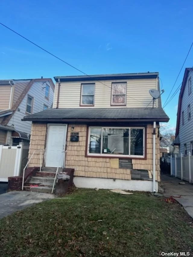HANDYMAN SPECIAL- INVESTORS DELIGHT! THIS DIAMOND IN THE ROUGH 2 FAMILY QUEENS VILLAGE REO PROPERTY FEATURES 4 BEDROOMS, 3 FULL BATHS, UNFINISHED BASEMENT, AND DETACHED GARAGE! A MUST SEE! WILL NOT LAST! BUYER WILL ASSUME ALL ECB PAYMENTS. BUYER IS RESPONSIBLE FOR CLEARING VIOLATIONS.