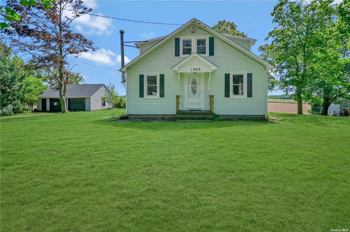 Sold As-Is. Cash Only or 203K Loan. Cape style home built in 1918. The interior is approximately 1400 square feet. Hardwood Floors. Detached two car oversized garage. Peconic Tax Applies To This Property.