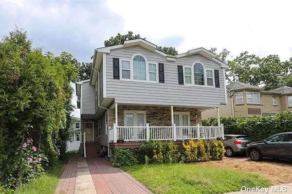 Beautiful mint condition home in a 2 family side-by-side house in Manorhven Port Washington next to the ocean, access to beach and park and several shops and restaurants in a great school district