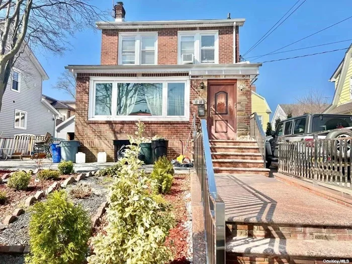 Amazing opportunity to own this spacious and brick two dwelling, This fully detached home in most desirable neighborhood, Lot 50X100,  R3X  Features hardwood floors, update kitchen with granite counters, split AC systems in every bedroom, full finished attic , fenced yard, Private driveway and detached garage. Walking distance to LIRR , one block to Northern Blvd , Bus Q26, Q27, Q31...