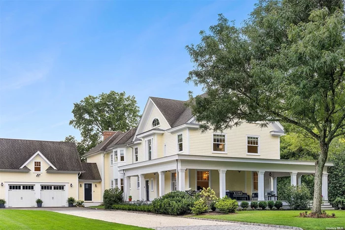 A Plandome Wraparound Porch Colonial Revival Masterpiece on a double lot. Rebuilt from the ground up and expanded in modern elegance and timeless flair by the famed architect Guy Ladd Frost of the Rhode Island School of Design. The house is approximately 6, 000 square feet plus a represented additional 1, 600 square feet lower level, 7 bedrooms and 5 full and 2 1/2 stunning baths with contemporary marble design from The Walker Zanger Studio. New exquisite private vaulted loft which can be used as bedroom suite, executive office or yoga studio with lovely views of manicured grounds and pool. Spectacular Heated Salt Water Gunite Pool with expansive brick patio and a lush private setting with mature plantings for entertaining. The commercial developer/owner was instrumental in the design of this prewar Colonial Revival reconstruction.  Other features of this amazing home include: custom millwork throughout, modern chef&rsquo;s kitchen with Wolf appliances and Sub-Zero refrigerator, 10-foot ceilings, 16 zone hydronic & radiant heat, 8 zone AC, 400 Amp electrical service, commercial gas boiler, 150-gallon indirect water heater and central vacuum. 3 tower washer/dryers in 2 laundry areas. Security System and full house generator ready. New 1, 600 square foot lower level featuring Refreshment Kitchen with Wine Tower, Refrigerator and Dishwasher, and Entertainment Center, Media, Wellness Areas, abundant closet and storage space and laundry. 2.5-car attached heated garage with pet grooming station. Plandome Field & Marine w/tennis, beach & mooring rights (fee).