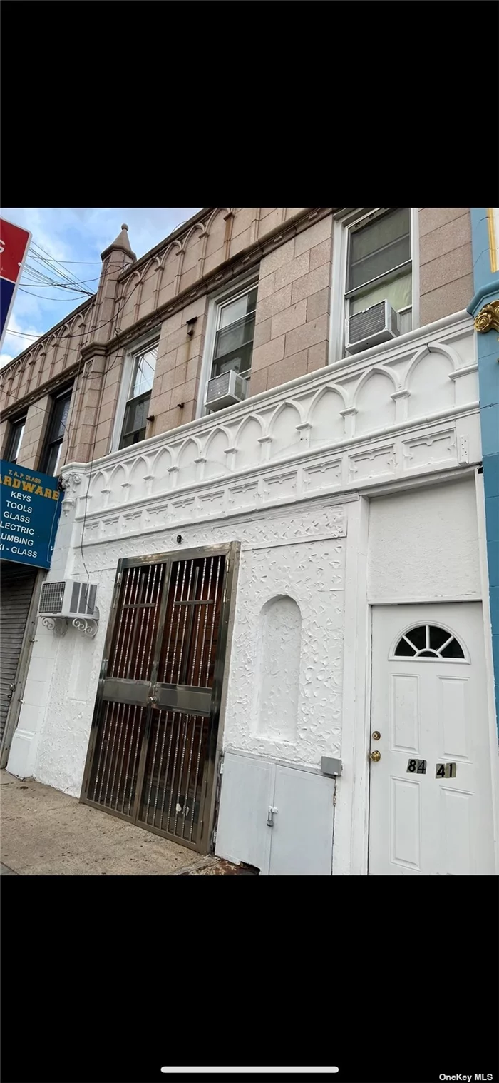 First floor store is currently being used as a church. Two apartments upstairs.