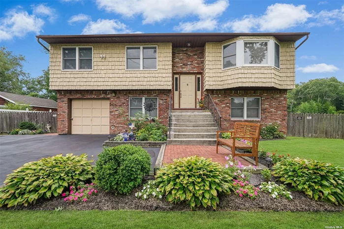 This Hi Ranch has much to offer in the Islip School District. Main section has 4 Bedrooms and 2 Bathrooms. Room for Mom with a 1 Bedroom, 1 Bathroom, other (check local zoning) and OSE. Large rear yard. Please note the grass has been photoshot.