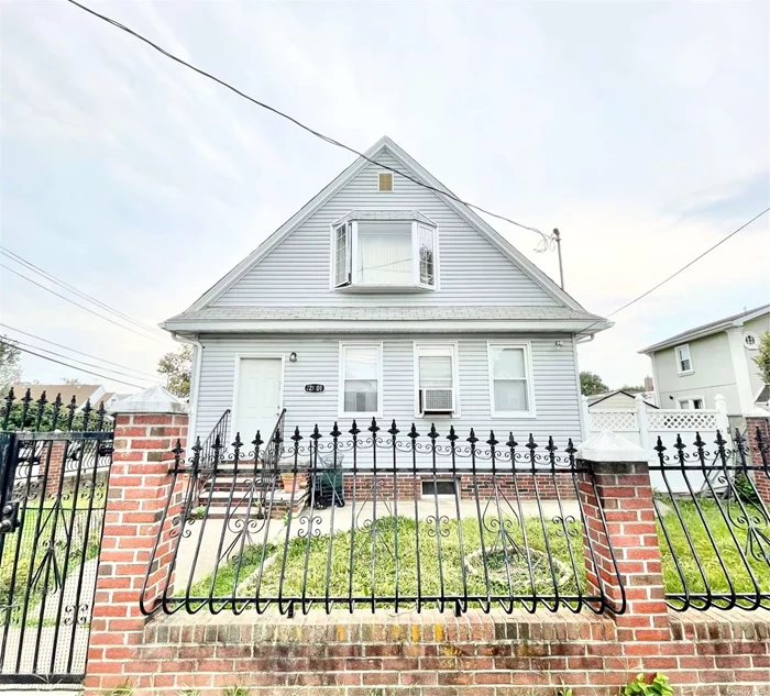 This 3 bedroom 2 bathroom Cape is nestled on an almost 5000 sq ft corner lot in prime north queens village. Separated living room, dining room and kitchen with plenty of closet space throughout. HUGE backyard with a private driveway. Basement is full and finished with a separate entrance. Close to all major transport, sitting between Hillside Ave and Jamaica Ave.