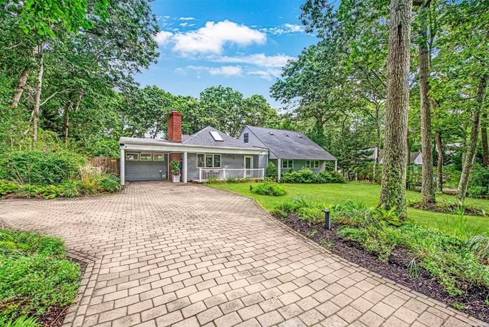 Stylish Beach House in Wainscott Beautifully maintained beach house near everything in the hamlet of Wainscott. Cheerfully decorated, this home is crisp and tasteful. There is an open living room with stone fireplace, dining area, den and kitchen with stainless appliances. The first floor primary bedroom suite has a king bed and opens up to a private deck. It boasts a large TV and generous walk-in closet. Additionally, there is a guest bedroom with queen bed, an office and a full bath on the first floor. The second floor has a large bedroom with two full beds and a sitting room. The lower level which adds about 500 square feet of finished space has an exercise area that includes a Peloton, a theater room and a full bathroom. The house has central air conditioning. Outside the 20&rsquo; x 40&rsquo; saltwater heated pool is situated for privacy. There is lots of decking and a gas Weber grill. Owners have added an EV Charging Station for summer tenants. Enjoy this home two miles from the Ocean at Beach Lane for the Summer of 2024.