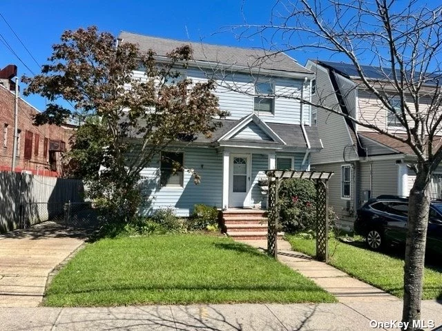 Detached awesome colonial home with large backyard, private driveway and huge garage with loft apt. A must see. This beauty will not last. Located with in steps of 3 major bus lines, close to the Grand Central, Shopping center and schools.