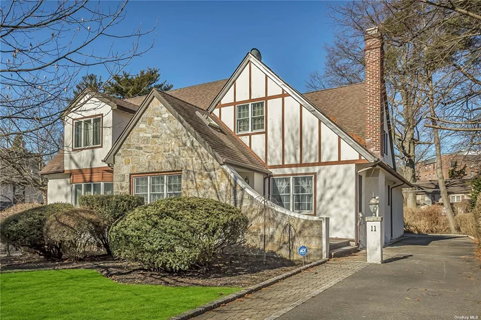 Great Neck. Bright & Spacious 4Br 2.5Bth Tudor on a 80 x 120 Lot in The Village of Russell Gardens. Clean & Modern Interior Finishes, Foyer, Living Rm, Formal Dining Rm, Eat-In Kitchen w/Stainless Steel Appliances, Family Rm w/Fireplace, 1 Bedroom, 1/2 Bath on 1st Floor. Huge Master Suite w/Walk-In Closet, 2 Bedrooms, Hallway Bath on 2nd Floor. Full Finished Basement, Laundry Rm, Storage. Attached 2-Car Garage. Gas Heating, Central AC. Beautiful Backyard with Deck. Russell Gardens Village Park, Tennis Courts & Pool. Russell Gardens Association Maintenance Fee $1, 400/Year. Zoned Lakeville School. Great Neck South School District. School Bus Runs on the Street. 0.1mi to n20, n21, n25, n26 buses. 0.3mi to LIRR Station.