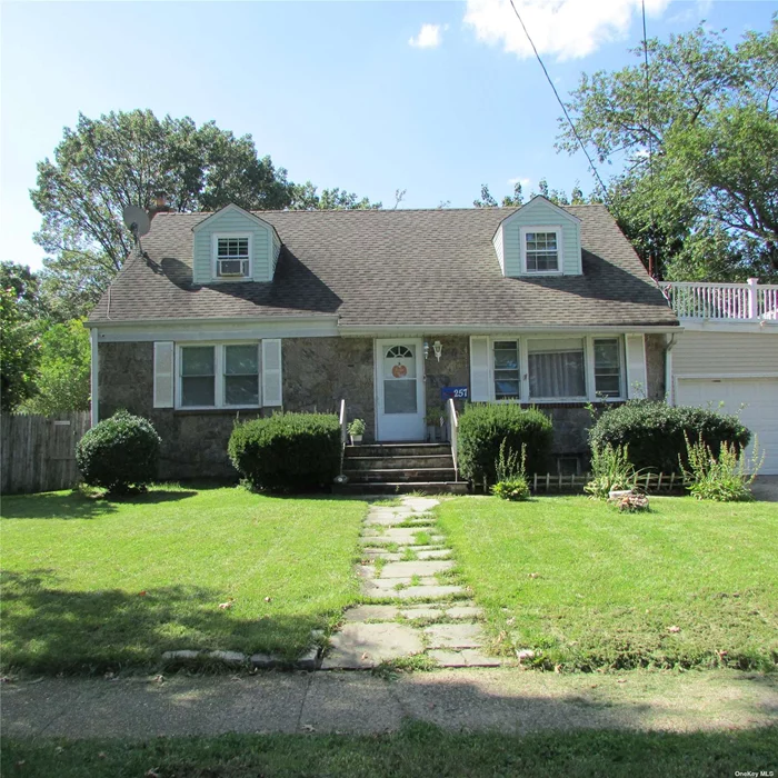 Updated Cape with room for everyone. 1st floor has a primary bedroom, 2nd bedroom, and full bath. Living room with bay windows, large eat-in kitchen with additional room for storage, 1 car garage. 2nd floor has 2 additional bedrooms, an office (which can be a 3rd bedroom and full bath. The basement is extra large with a washer/dryer, and 2 large rooms. Extra large backyards with a small above-ground pool and patio.