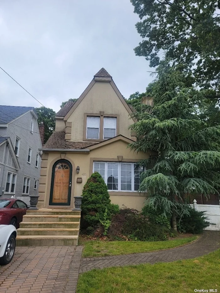 Three-bedroom two bath home on a dead-end street with a large backyard With detached garage. Formal Livingroom-Formal dining room-EIK- Partial Basement. Walk-up attic is finished. Gas heat & Hot water-Sewers.Close to highways and shopping.