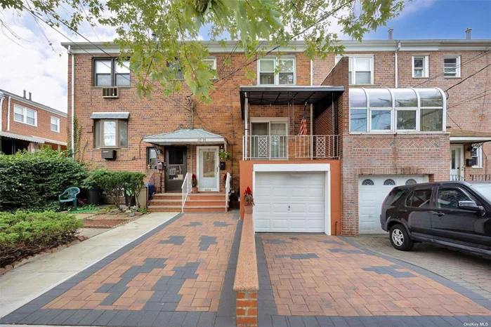 Move right into this lovely Brick 2 family home. Lower level is a walk in 1 bedroom, 1 bathroom apt with sliders to yard. 1st & 2nd floors are duplexed and feature: EIK, FDR, LR, 1/2 bath on 1st floor and 3 bedrooms and 1 full bath on the 2nd Fl. This lovely home also boasts a front porch, 2nd floor balcony, 1 car garage, private driveway and a beautiful yard. Great Middle Village location, near all.