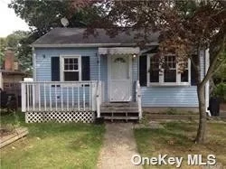 Nice 2 Bedroom 1 Full Bath Ranch with living room den kitchen laundry room with washer & dryer. New Wood type flooring!!