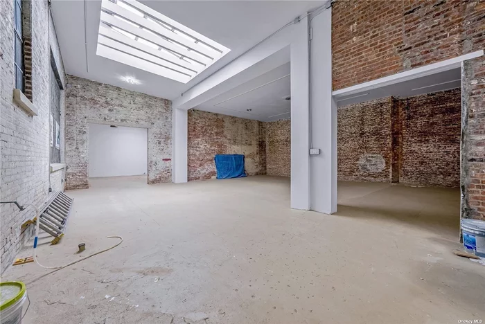 Please note: This space has entrance on 36th St., not on Queens Blvd. Commercial space for lease. All use considered. Can be divided. Very high ceiling. Exposed brick walls. Concrete floors. Amazing space. Ideal for showroom, gym, event space, community facility, etc..