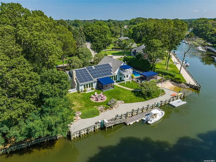 This waterfront gem has it all! 157&rsquo; on Fordham Canal with deep water docking and easy access to the Bay! Absolutely immaculate 5 bedrooms, 3 baths, high-end appliances, and an open floor plan with water views from every room! Step outside and you&rsquo;ll find an in-ground pool, sandy beach and water toy launch area, outdoor shower, screened-in patios, and a large fire-pit area. It&rsquo;s the perfect place to spend your days swimming, sunbathing, fishing, kayaking, paddleboarding or run into Greenport Village to dine, shop, or stroll the streets! And when you&rsquo;re ready to relax, head inside to enjoy the spacious living room with fireplace, gourmet kitchen, or one of the many bedrooms. This home is truly a one-of-a-kind, and it&rsquo;s the perfect place to make your permanent vacation spot!