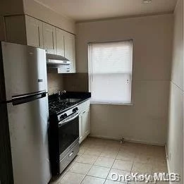 Sunny and Bright 2 Bedroom Apartment on the 2nd Floor in Bayside. Updated Kitchen. Hardwood floor. Parking is Included. Heating is included. Close to Everything. A Must See