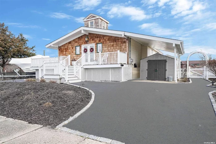 Updated Waterfront Ranch with Bay Views. 8 Rooms, 3 Bedrooms, 2 Full Baths, Open FLoor Plan, Wrap Around Porch, Vaulted Ceilings and Sky Lights, Master Suite with Balcony. Energy Star Appliances and Windows. Part Finished Basement with Walk out to Back Yard and Waterfront.