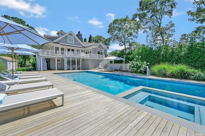 This custom built Nantucket style home is nestled at the end of a long gated driveway, offering unparalleled privacy and captivating western views over Quantuck Creek. It boasts a range of exceptional amenities, making it the epitome of luxury living. The property features a private boat dock, kayak launch, perfect for water enthusiasts, a 20x40 heated gunite pool/spa with electric cover, and an all-weather tennis court, ensuring year round recreation and entertainment. Inside, the open floor plan is thoughtfully designed for entertaining, allowing you to enjoy breathtaking water views from the living room, kitchen, and dining area. The chef&rsquo;s kitchen is a culinary masterpiece, equipped with a spacious island, custom-built buffet, dining area, and top-of-the-line Viking, Fisher Paykel, and Sub Zero appliances. The living room is a showstopper, with its soaring ceilings, beautiful wood beams, and a dual gas fireplace shared with the kitchen, creating a warm and inviting ambiance. The master suite features a spa bathroom complete with a separate water closet, soaking tub, and shower. The custom designed dressing room adds luxury and convenience. Three more well appointed bedrooms, along with 2.5 bathrooms, ensure that there is plenty of space for everyone. A second living room with a fireplace provides a cozy retreat for relaxation. The third floor loft offers an additional area for work or play, with a bonus room that could easily serve as a potential fifth bedroom. The stunning design and exceptional amenities of this property offer elegant comfort for living, playing and entertaining. The sunsets are spectacular at this beautiful Quogue Village property.