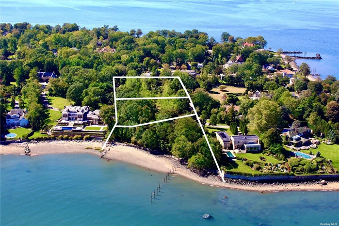 An Expansive 3.5 Acres of prime property, with approximately 430 feet of water frontage, located on one of the most sought after streets in the prestigious Village of Kings Point. The property has a private beach, docking rights and is already sub-divided into 3 separate lots.