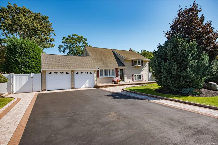 Welcome to this meticulously renovated split ranch home! Experience the perfect blend of modern elegance and timeless charm in this open-concept gem. Step inside to discover gorgeous hardwood floors and recessed lighting that seamlessly flow throughout the living spaces. The heart of this home is the stunning eat-in kitchen, boasting Kraftmaid maple cabinets, Quartz countertops, and top-of-the-line stainless steel appliances. Host unforgettable dinners in the formal dining room with a coffered ceiling or unwind in the formal living room, basking in the natural light pouring in through the Bay window. With three spacious bedrooms and two full baths, there&rsquo;s plenty of room for loved ones and guests. Need extra space? The walk-up attic is ready for your personal touch. For casual gatherings, the cozy den with sliding glass doors leads to your outdoor paradise. Step outside to your own oasis - a Trex deck overlooking a free-form lagoon-style heated saltwater inground pool, surrounded by Techo-Bloc pavers. Privacy is paramount, thanks to mature Leland Cypress trees bordering the expansive rear yard. Located in a sought-after area south of Montauk Highway, you&rsquo;ll have easy access to Heckscher Park trails, Bayard Cutting Arboretum, Timber Point Golf Course, and the East Islip Marina. This is not just a home; it&rsquo;s a lifestyle. Don&rsquo;t miss your chance to make it yours!