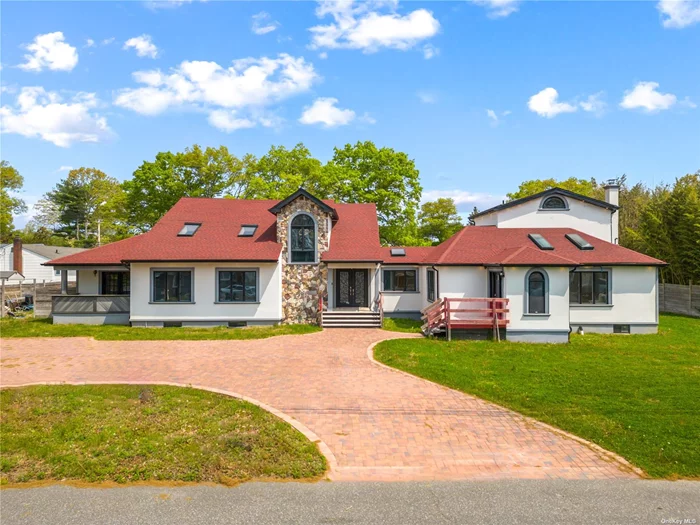 Contemporary colonial in an amazing pocket of Dix Hills. This luxurious home boasts tasteful finishes throughout with a mix of elements such as stone, granite, and marble. As you drive up to this magnificent home in its horseshoe driveway your eyes will be in awe of the beautiful white stucco and stone exterior. Upon entry of this 3000sf you will be greeted with an abundance of natural light and air through the high ceilings and skylights. Exquisite chandeliers, draped over every living area make you feel like royalty. This home is perfect for entertaining and large families with its functional open concept design, each rooms energy flows seamlessly into the next. On the upper level of the home you will find a majority of the queen sized bedrooms and bathrooms. When you get tired of wandering around this enormous home, step outside to the tranquil backyard with in ground pool. One of a kind home waiting for its next owner!