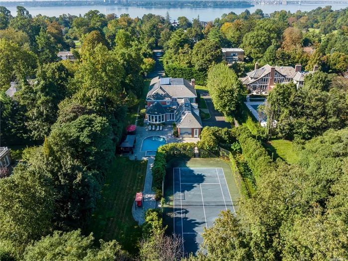 Nestled in the heart of the esteemed Village of Kings Point, 175 West Shore Road encompasses 1.2 acres with manicured exteriors, a long tree-lined gated driveway, a tennis court and an in-ground pool and spa. This beautiful brick residence, built in 2010, boasts 6, 000+ Sq.Ft. of pristine living space with 7 bedrooms and 8.55 bathrooms, featuring elegant wall-moldings, pocket doors, curved archways and rich hardwood floors throughout. The home&rsquo;s walk-out basement has tall ceilings, a kitchenette, Karaoke Stage with a disco ball, billiards room, matted fitness area and a wine cellar. Located within the Great Neck North School District with ample neighborhood benefits including Private Police Surveillance and Park Access.