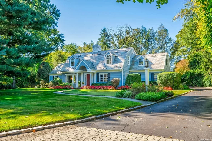 Immaculate 4-bedroom, 3.5-bath Dutch Colonial nestled in the heart of the Country Club section of Flower Hill, Port Washington. Gorgeous curb appeal and situated on a private landscaped flat shy half acre, this haven boasts meticulous attention to detail, inviting you to step into a warm embrace of home. From the enchanting den with a stunning brick feature wall, radiant heated floors and wood-burning fireplace to the chef&rsquo;s eat-in-kitchen adorned with high-end appliances, granite counters and center island, every space exudes charm. The main floor unfolds seamlessly, featuring a formal living room with a second fireplace, a bay-windowed dining room, and a convenient mudroom, with laundry and powder, leading from the 2-car attached garage. A first-floor bedroom suite adds a touch of versatility. On the second floor discover a spacious primary ensuite with two walk-in closets and a full bath, accompanied by two additional bedrooms and a full bath with double sinks. The basement offers recreation and storage. With CAC, in-ground sprinklers, alarm and more, this residence beckons you to savor every moment in comfort and style.