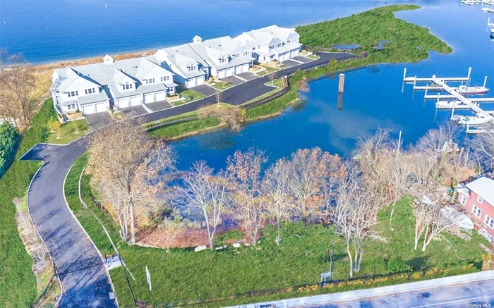WATERFRONT LUXURY LIVING at its Finest! Exquisite End Unit Boasts Stunning Water Views Showcasing the Most Beautiful Sunsets All Year Round. Upon Entering into this Expansive 2 Story Entrance, you will be Captivated by the airy and Open Floor Plan. The Sophisticated Living Room w/Fireplace and French Doors lead to Trex Deck Where the Entertaining Begins Overlooking the Harbor and Long Island Sound. There is a Cozy Den/Bedroom on the Main Level. The Spacious Quartz Center Island w/Seating in the Kitchen Makes it a Gathering Spot for both Friends and Family and was Designed for both a Culinary Enthusiast and Entertainer&rsquo;s alike. The Second Level offers a Large Primary Suite with a Charming Sitting Area w/Wet Bar & Fireplace plus a Radiant Heated Bath with French Doors Overlooking the Water. Across the Hall are 2 Spacious Bedrooms w/WIC&rsquo;s and a Radiant Heated Hall Bath. Additional Amenities Include a Heated Garage for your Comfort and Convenience plus this Home is also Equipped with a Generator and Security System. This Stunning Townhouse is Nestled within a Private Gated Community Surrounded by Water on all Sides and Lush Landscaping. It also Offers the Perfect Sanctuary with the Serene Beach Front Right Outside Your Door. Paddle Boarding, Boating and Kayaking are Just a Few of the Exciting Water Sports this Area Provides. Close Access to Major Thorough Fares, Leading to NYC or Out East plus the Finest Restaurants and Shopping. Ample Parking and Very Private Side Property. This Idyllic Retreat Offers Security, Peace and Tranquility.
