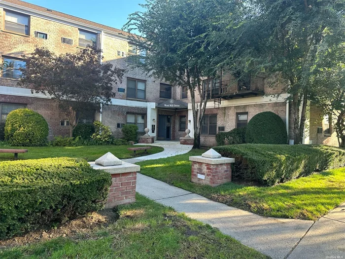 Desirable Great Neck Terrace 1st Floor 1BR w/Deeded 1-Car Garage conveniently located behind unit (new garage door & opener). Entry Foyer, EIK w/Gas Cooking & Tile Flrs, Dishwasher, Lrg LR w/Wood Flrs & In-Wall A/C, Lrg Closet, Lrg BR w/Wood Flrs & In-Wall A/C, Full Bath. Pet friendly allows 1 Dog or 2 Cats. Alarm System. New Heat Sensor to moderate heat in building. Enjoy the amenities of an Olympic Size Swimming Pool & Kiddie Pool, Dog Run, Basketball Court, Beach Volley Ball Court, Playground & Party Room. Super/Management Crew & Security Patrol on-Site! Very Close to Little Neck LIRR direct route to Penn Station/Grand Central within 30 min. train ride. Centrally Located to Shops & Restaurants. Maintenance Includes: Taxes, Water, Hot Water, Heat, Landscaping, Snow Removal & Pool Pass for Residents. Laundry in Basement. Move-In and Enjoy all the benefits this community has to offer!