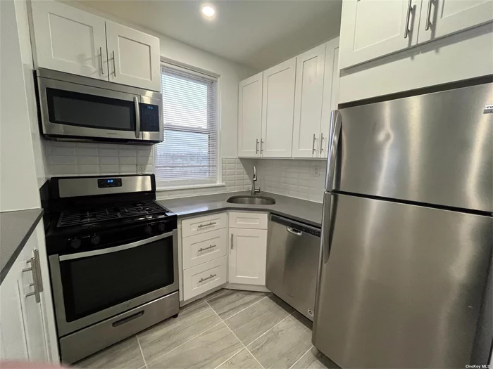 Totally Renovated 2 Bedroom, 1 Full Bath Apartment With Washer/Dryer, Kitchen with quartz countertops. Stainless steel appliances. Full Bath With shower & tub. Recessed lighting, high ceilings, hardwood floors, 2 A/C units, and Free storage. Smart Intercom Service With Handsfree Access..