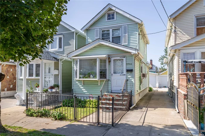 Great starter home that is just waiting for your cosmetic updates. The main level has plenty of space with the living room, full dining room and large kitchen. There is additional space in the full basement which has a side door entrance. You will enjoy relaxing on the back patio. You have the benefit of a garage. The home is located on a residential block in South Ozone Park. It is conveniently located near public transportation, near the Van Wyck Parkway and near JFK. Come out and check out all this home has to offer.