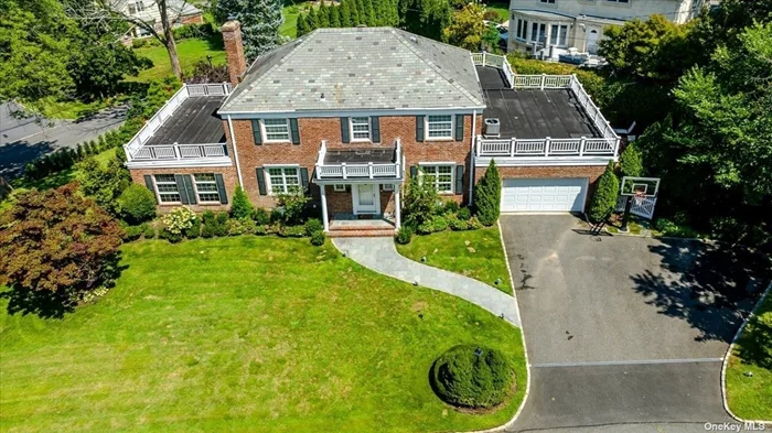 Welcome To This Gracious and Elegant Center Hall Colonial With Winter Water-Views. A Beautiful Foyer Welcomes You Into This Home With Large Entertaining Rooms Which Include a Formal LIving Room & Large Den Sharing a Double Sided Fireplace. Formal Dining Room, Library and Oversized St. Charles Kitchen With State of The Art Appliances. A Marble Powder Room and an En-suite Guest Quarter With Full Bath Complete the 1st Floor. The 2nd Floor Boasts Master Bedroom With Full Bath and Walk-in Closets. 3 Additional Bedrooms and 1 Full Bath Makes This Home a Perfect Place To Reside. All Doors Lead Out To A Beautiful Lush Property With Several Outdoor Spaces & Patios With Lots of Grass Surroundings. Central A/C and Heated Garage. This Fabulous Home is Located In The Prestigious Community of Harbor Hills With Waterfront Private Pool, Tennis and Dock Enyoy a Country Club Lifestyle!