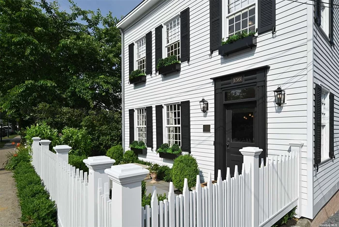 Four level historic house at 156 Main Street has been completely renovated (2023) and is offered for rent. In the heart of Sag Harbor Village this beautiful compound which includes a separate lower level with kitchen, two bathrooms and its own entrance. One of several Captain&rsquo;s houses dating back to 1806, this Sag Harbor classic offers twin parlors plus a large modern kitchen with dining area on the first floor. Three bedrooms including the master on the second floor and a third-floor bedroom suite with kitchenette. Elaborate brick and bluestone terrace with built in barbecue grill and outdoor furniture and dining tables. Heated gunite swimming pool with hot tub plus pool house with sink, refrigerator and full bath. Expertly decorated and furnished, this is a turnkey rental opportunity which has not been occupied. Be the first to experience the sensational design and craftmanship of this total renovation.