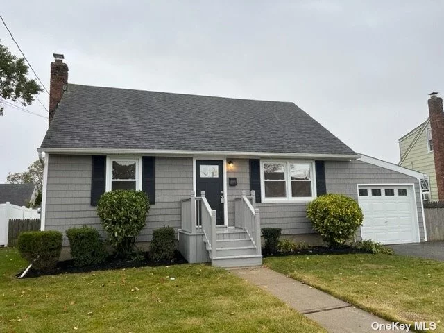 Renovated 4 Bedroom Cape. New Kitchen offing Quartz Counter Tops and SS Appliances. Full Unfinished Basement. 1 Car Attached Garage. New Vinyl Siding. Hardwood Floors on first floor.