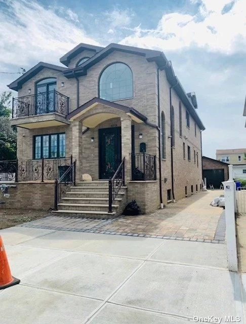 First Floor Front, Huge Kitchen, Beautiful Island With Half Bath. Second Floor Huge Living Room With Balcony. Two Big Master Bedrooms With Closet, Bedroom, Full Bathroom. First Floor Back Two Bedrooms, 2 Baths. Separate Laundry Area. Full Basement.