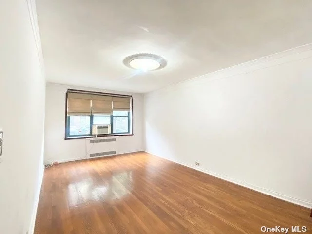 Spacious 1Br in the heart of the Historic District of Jackson Heights . Dunolly Garden is well know for its Large private garden, and it&rsquo;s excellent location. Great for pet owners. Bright 1 Fl unit w southern exposure, hard wood floor through out , windowed kitchen and bathroom, excellent closet space. BEST LOCATION, peaceful tree lined residential block, short walk to express transit hub with access to 7EFRM and buses to LGA. Close to all , PS69 , restaurants , travers park , Sundays farmers market.