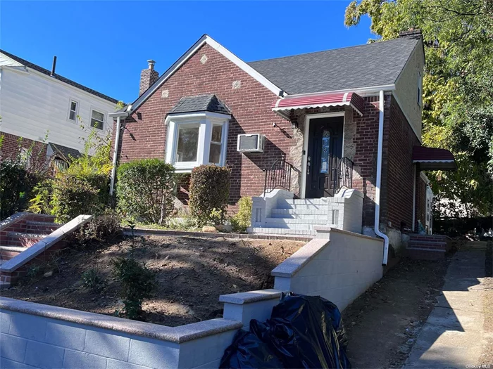North of Hillside in Queens Village. Beautiful Detached Brick Cape. The 1st floor is newly renovated with 2 Brs, Lr, Fdr, Eik and Den and all new appliances. The 2nd floor has an unfinished room and can be a 3rd Br with walk up stairs. Brand new wood floors throughout and new roof.