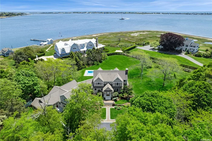 Stunning 5 Bedroom, 4.5 Bathroom, 5000 Square Foot Private Residence Situated On A Cul-De-Sac Location With 1.84 Tranquil Acres And Spectacular Views Of Moriches Bay! Step Into Timeless Elegance With A Luxurious Gourmet Chef&rsquo;s Kitchen With Quartz Countertop And Stainless Viking Appliances, A Grand Formal Dining Room, And A Spacious Family Room With Fireplace, Unparalleled Water Views And So Much More. Exquisite Primary Bedroom Suite That Provides A Peaceful Oasis Boasting A Fireplace And Large Balcony Overlooking The Bay. Impeccable Craftmanship And Modern Decor Featuring The Highest Quality Finishes And State-Of-The-Art Amenities, Creating A Unique Living Experience. This Home Allows You To Experience Coastal Living At Its Best With A Sprawling Lawn, In-Ground Pool, And Expansive Patios For Lounging And Dining While Enjoying Sensational Sunsets! Just Minutes From The Beautiful Town Of Westhampton, Restaurants, Shopping, Vineyards And Exceptional Ocean Beaches!