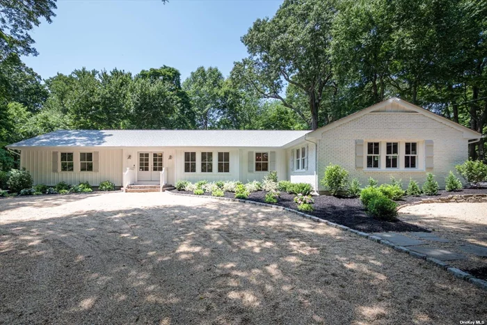 Beautifully renovated architectural gem set on 2.58 park-like acres in the heart of Oyster Bay Cove. Boasting 4 bedrooms, 4 baths, this Ranch-style home offers a blend of luxury and elegance. As you step inside, you&rsquo;re greeted by an inviting foyer that leads into a great room bathed in natural light and adorned with a soaring ceiling, fireplace and large windows provide stunning views. The gourmet kitchen is a chef&rsquo;s delight, designed with high-end Bertazzoni appliances and natural Taj Mahal Quartzite counters, plus a walk-in pantry with coffee bar and beverage fridge. A spacious living room and dining room with original built-ins create an elegant setting. The primary bedroom is a true oasis complete with a spa-like ensuite bathroom with soaking tub and shower. The attached three-season screened-in porch with composite decking is the perfect spot to enjoy your morning coffee. Additional features include two well-appointed bedrooms, full bath, separate guest room/office and full bath. Mudroom and laundry area. Finished basement offers versatility and space for recreation, with full bath, second laundry, and an egress window. The exterior is equally impressive. The Azec Board and Batten siding, new roof, gutters, and Andersen windows enhance the home&rsquo;s curb appeal. The circular stone driveway with Belgium blocks adds a touch of sophistication, complementing the two-car attached garage with blacktop driveway and fire-pit area. With Shiplap walls, hardwood floors, custom molding, LED lighting, closet systems and sprinkler system, this residence leaves no detail overlooked. Private beach (dues). Conveniently located to Oyster Bay Village. Low Taxes!