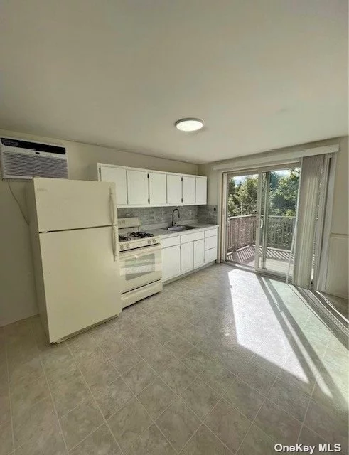 Renovated and Ready for Move In! Lovely Water Views with Private Balcony, Small Pet Considered, Washer Dryer IN Unit, Landlord Pays Heat, HW, Gas, Tenant is Responsible for Electric (own meter) and internet/cable