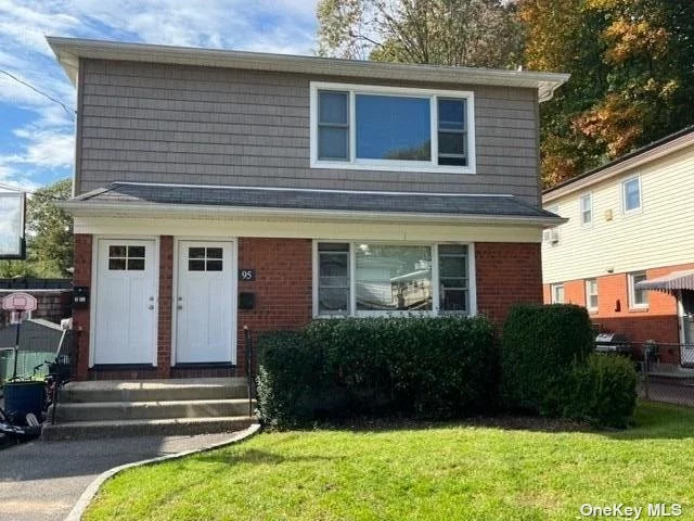 First Floor Three Bedroom Apartment with Brand New Kitchen. Hardwood Floors. Large Finished Basement Area with .5 Bath and Washer/Dryer. Shared Backyard, Driveway Parking.