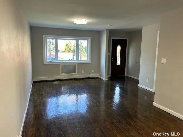 Spacious Modern Living Room + 3 Bedroom, 2 Full Bath, Hardwood Floors Throughout and more!