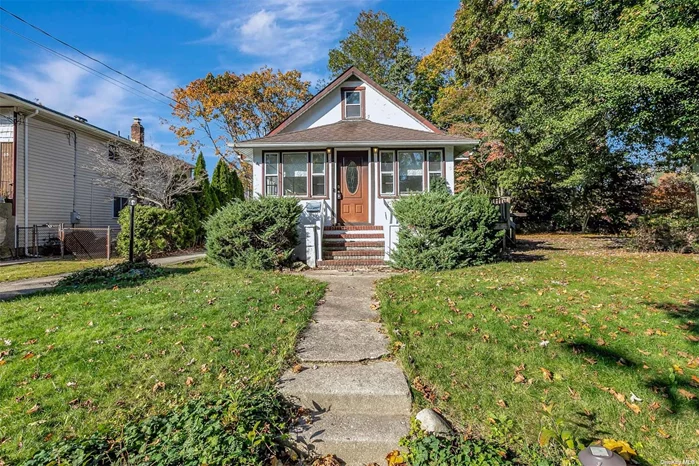 Wonderful Opportunity to own your own vintage bungalow on the end of a dead end street. Boasting a large flat property and private driveway. The home itself is a throw-back to an era gone by with a rich history in the Bethpage area when you walked to the train to work with ease. This commuter friendly, quiet spot is just what you need! Enter in to this sunlight front room which can be used as a sitting room, a stunning office, a library and so much more. Beyond that is a spacious living room with a gorgeous Andersen door to the expansive deck. A large dining room area sits between the living room and kitchen and brings in the outdoors with its beauty bow window. The eat in kitchen has solid wood cabinetry to the ceiling and has all the amenities of today&rsquo;s living with tons of natural light. There are two bedrooms on this main floor and a large full bathroom with tub in the sky-lite room. Generous 9 ft. ceilings are throughout the main floor. Upstairs boasts a huge walk up finished attic space that has tons of storage and two finished areas that can be future bedrooms with a quick addition of heat. The full basement which hosts an inside entrance has an updated oil burner and new inside oil tank along with a 200 amp electric panel and the laundry for the home. There is tons of storage and an entrance to the rear yard. The possibilities are endless with this space and your imagination. The beautiful, level yard houses a large shed for all of your outdoor needs. Again, the entertainment deck is perfect for your outdoor living. The end of dead-end location allows for privacy and the mature trees call all that nature has to offer. A bit of basic decorating and you have yourself the Gem of Bethpage. Low taxes, the convenience of a small town and proximity to easy NYC commute. It&rsquo;s a homerun. Hurry!
