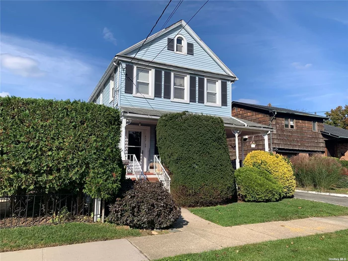 This charming detached Colonial is located in beautiful NE Bayside, only blocks to the LIRR, schools, shops, restaurants, Corcheron Park, and houses of worship. This lovely home features 3 bedrooms and 1.5 bathrooms on a 40 x 100 lot with a detached garage. The main floor is warm and inviting with a Living Room, Formal Dining room which is open to the kitchen, and enclosed Sun Porch with a Half Bath in the rear. The Basement is partially finished with a separate Laundry area and the Attic is walk-up, open, unfinished.