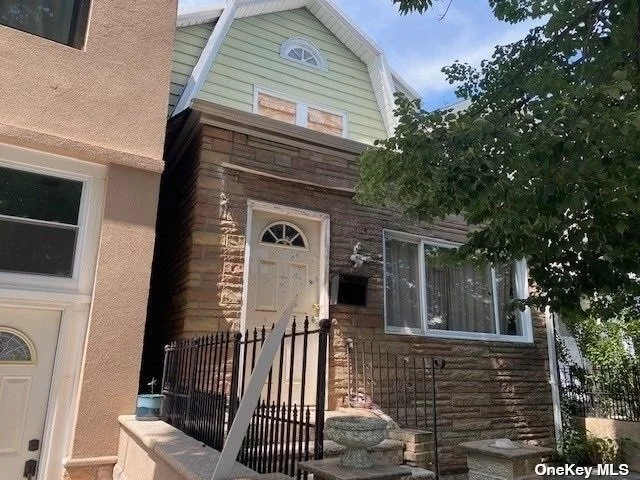 One family Home with four bedrooms three bathrooms. Totally renovated with New Windows, Doors, New Roof, New Hardwood Floors, New Interior Walls, New Bathrooms and Fixtures, New Gas Boiler and Hot Water Heater. Quartz countertops.