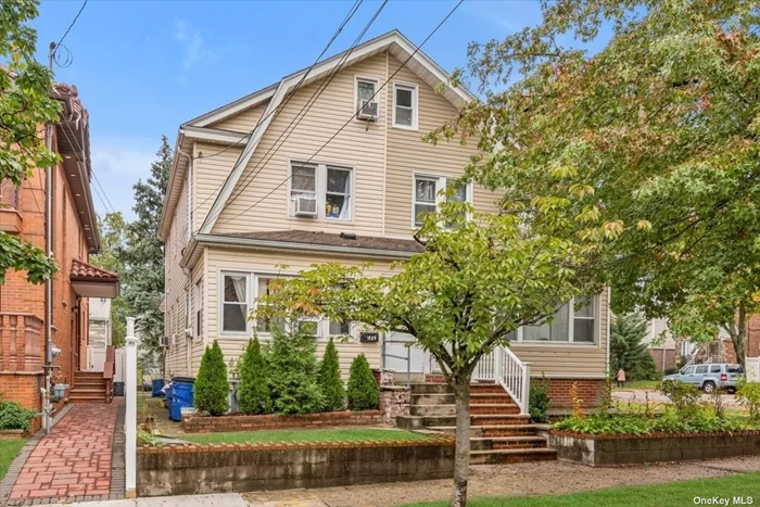 Legal Semi Detach Two Family house in heart of Whitestone. First Family :Basement + First Floor. .Second family : 2F + Attic. 2014 Totally Renovation. 2 Gas Meter 2 Electric Meter. Nice Backyard. Garage. Low Property Tax. Good for Investment.