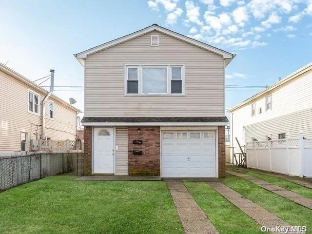 Living Room, Eat In Kitchen area (No dishwasher), 2 Bedrooms, 1 Full Bathroom, Shared Washer/Dryer with Upstairs Tenants, 2 large in Size Bedrooms with Hardwood flooring, One Parking Spot in Driveway, Shared Yard. No Dishwasher. No smoking, 24 hr notice